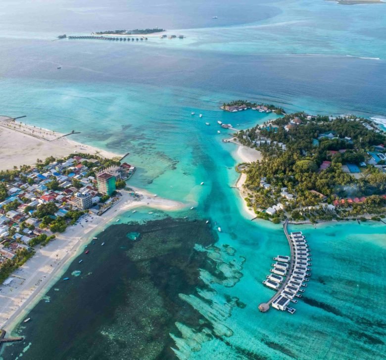 aerial-view-of-a-tropical-island-with-clear-turquo-2026-03-18-05-41-06-utc (1)