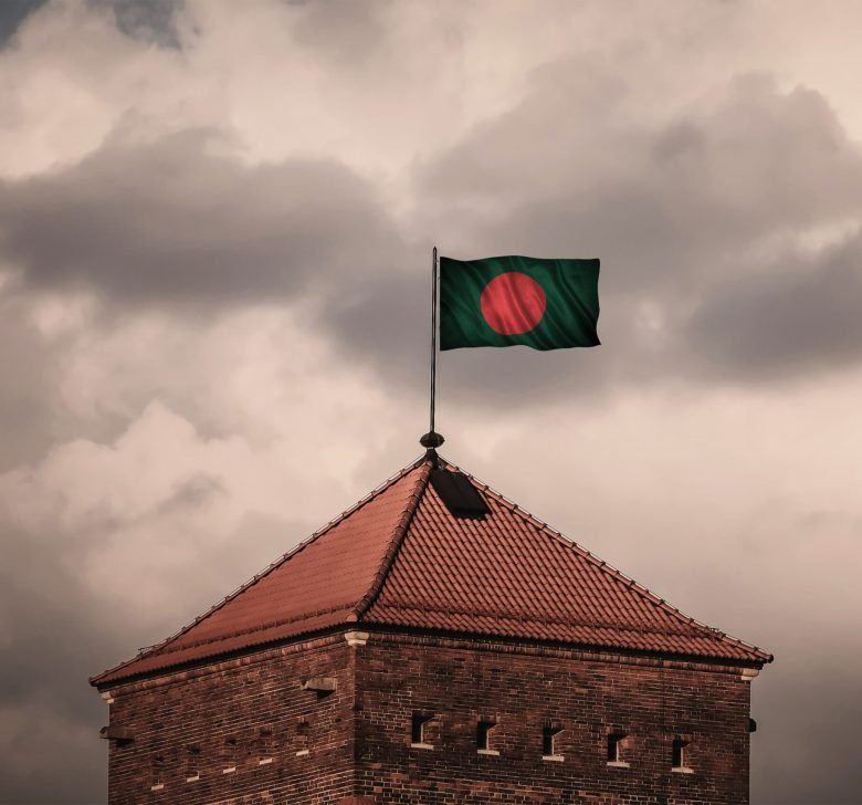 bangladesh-flag-atop-historic-brick-building-with-2026-01-09-14-53-01-utc (1)