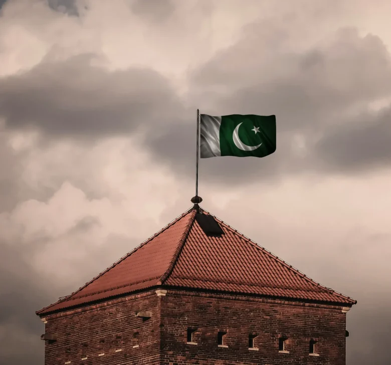 flag-over-ancient-tower-under-cloudy-sky-2026-01-09-13-55-34-utc