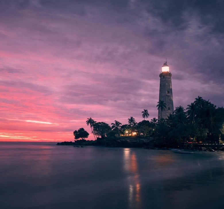 tropical-lighthouse-at-dawn-in-coastal-setting-2026-03-18-20-41-24-utc (1) (1)